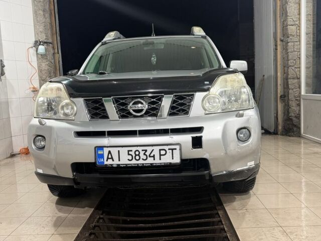 Сірий Ніссан ІксТрейл, об'ємом двигуна 2.5 л та пробігом 175 тис. км за 7600 $, фото 1 на Automoto.ua