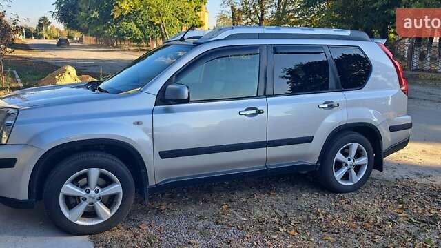 Сірий Ніссан ІксТрейл, об'ємом двигуна 2.49 л та пробігом 327 тис. км за 12000 $, фото 24 на Automoto.ua