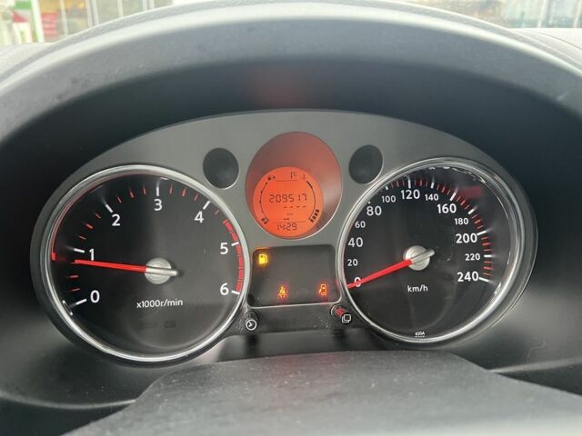 Сірий Ніссан ІксТрейл, об'ємом двигуна 2 л та пробігом 209 тис. км за 5200 $, фото 13 на Automoto.ua