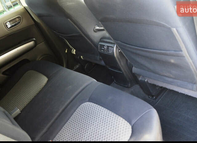 Серый Ниссан ИксТрейл, объемом двигателя 2 л и пробегом 180 тыс. км за 9500 $, фото 14 на Automoto.ua