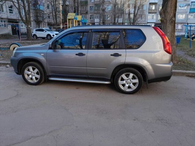 Серый Ниссан ИксТрейл, объемом двигателя 2 л и пробегом 195 тыс. км за 8300 $, фото 3 на Automoto.ua