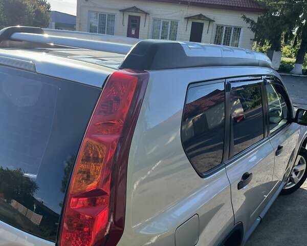 Серый Ниссан ИксТрейл, объемом двигателя 2.49 л и пробегом 195 тыс. км за 9800 $, фото 10 на Automoto.ua