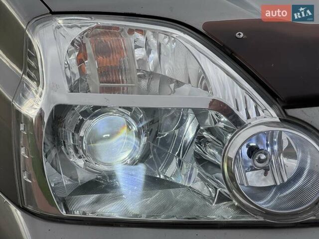 Сірий Ніссан ІксТрейл, об'ємом двигуна 2 л та пробігом 238 тис. км за 9400 $, фото 26 на Automoto.ua