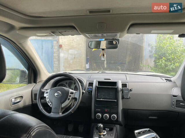 Серый Ниссан ИксТрейл, объемом двигателя 2 л и пробегом 349 тыс. км за 6900 $, фото 11 на Automoto.ua