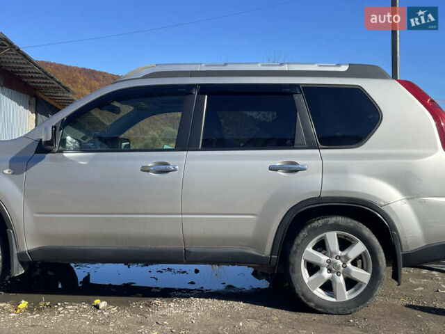 Серый Ниссан ИксТрейл, объемом двигателя 2 л и пробегом 340 тыс. км за 9500 $, фото 3 на Automoto.ua
