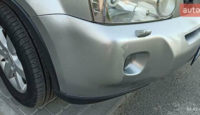 Серый Ниссан ИксТрейл, объемом двигателя 2 л и пробегом 220 тыс. км за 9800 $, фото 5 на Automoto.ua