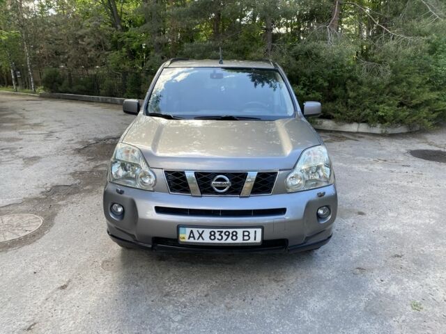 Серый Ниссан ИксТрейл, объемом двигателя 2 л и пробегом 218 тыс. км за 7350 $, фото 6 на Automoto.ua
