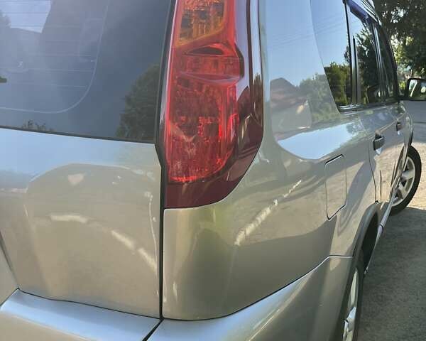 Серый Ниссан ИксТрейл, объемом двигателя 2.49 л и пробегом 195 тыс. км за 9800 $, фото 14 на Automoto.ua