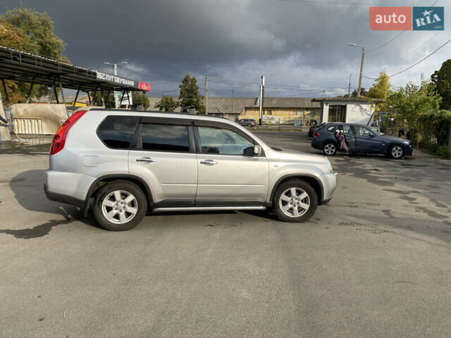 Серый Ниссан ИксТрейл, объемом двигателя 2.49 л и пробегом 226 тыс. км за 8300 $, фото 2 на Automoto.ua