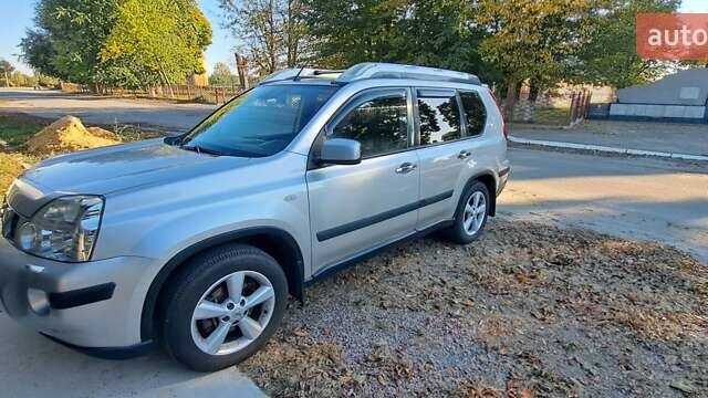 Сірий Ніссан ІксТрейл, об'ємом двигуна 2.49 л та пробігом 327 тис. км за 12000 $, фото 29 на Automoto.ua