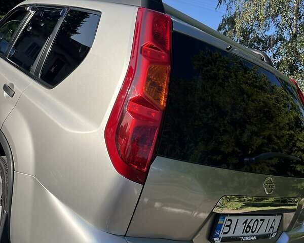 Серый Ниссан ИксТрейл, объемом двигателя 2.49 л и пробегом 195 тыс. км за 9800 $, фото 7 на Automoto.ua