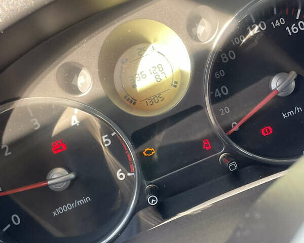 Серый Ниссан ИксТрейл, объемом двигателя 2 л и пробегом 340 тыс. км за 9500 $, фото 6 на Automoto.ua