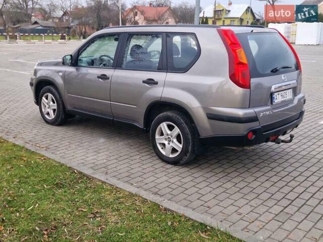 Сірий Ніссан ІксТрейл, об'ємом двигуна 2 л та пробігом 212 тис. км за 9900 $, фото 6 на Automoto.ua