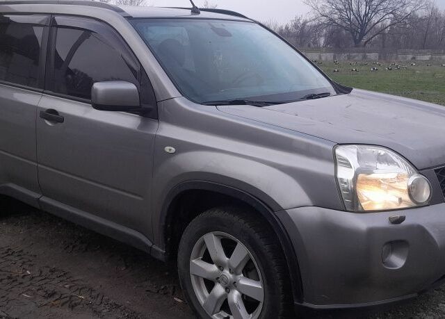 Серый Ниссан ИксТрейл, объемом двигателя 2 л и пробегом 195 тыс. км за 8300 $, фото 11 на Automoto.ua