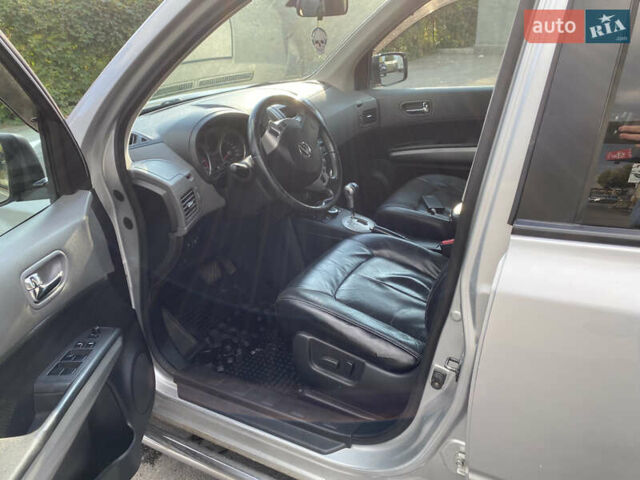 Серый Ниссан ИксТрейл, объемом двигателя 2.49 л и пробегом 226 тыс. км за 8300 $, фото 11 на Automoto.ua