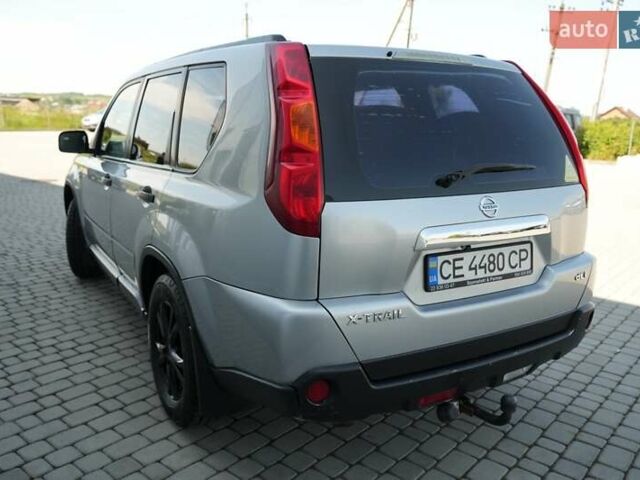 Сірий Ніссан ІксТрейл, об'ємом двигуна 2 л та пробігом 310 тис. км за 7900 $, фото 4 на Automoto.ua
