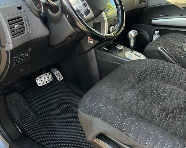 Серый Ниссан ИксТрейл, объемом двигателя 2.49 л и пробегом 195 тыс. км за 9800 $, фото 23 на Automoto.ua