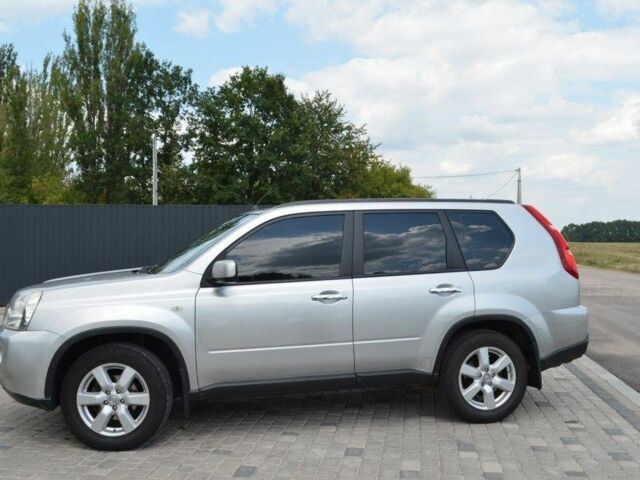 Серый Ниссан ИксТрейл, объемом двигателя 2 л и пробегом 317 тыс. км за 7000 $, фото 2 на Automoto.ua