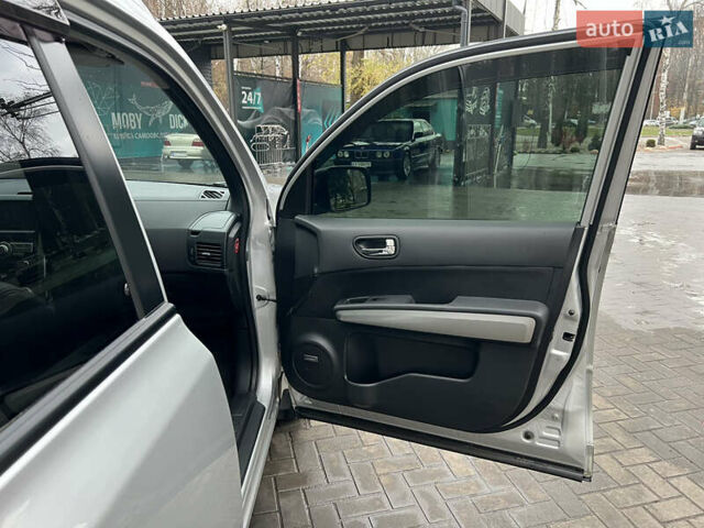 Серый Ниссан ИксТрейл, объемом двигателя 2 л и пробегом 153 тыс. км за 16500 $, фото 12 на Automoto.ua