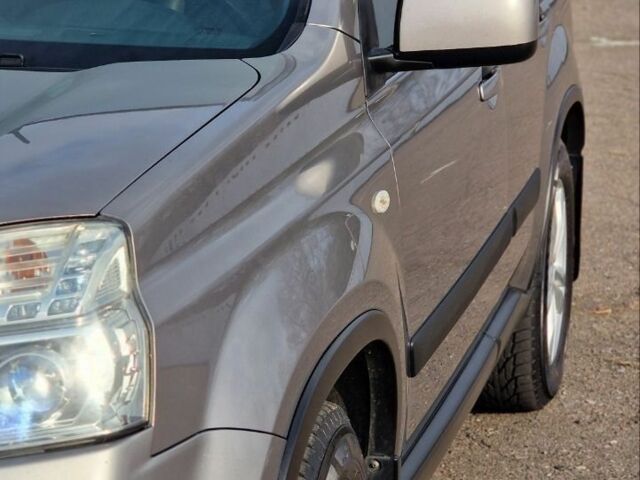 Сірий Ніссан ІксТрейл, об'ємом двигуна 2.5 л та пробігом 236 тис. км за 11000 $, фото 7 на Automoto.ua