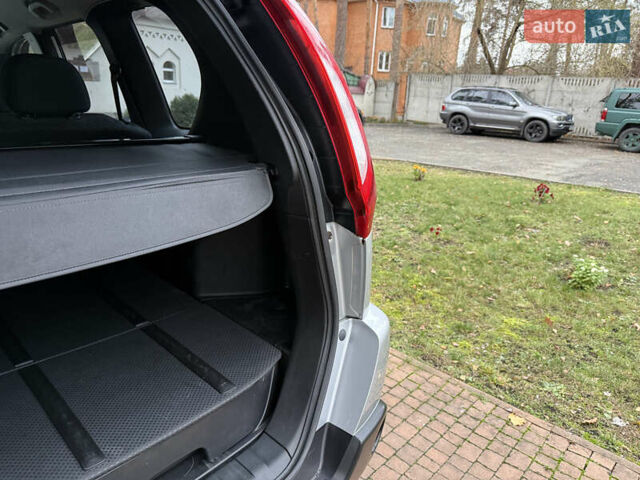 Серый Ниссан ИксТрейл, объемом двигателя 2.49 л и пробегом 199 тыс. км за 11700 $, фото 128 на Automoto.ua