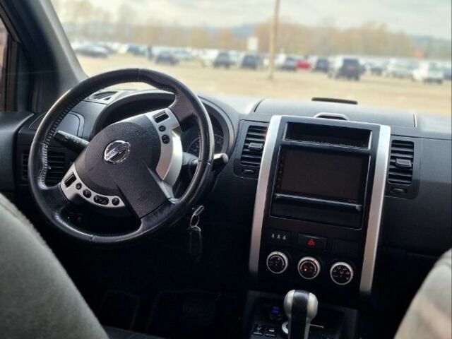 Сірий Ніссан ІксТрейл, об'ємом двигуна 2.5 л та пробігом 236 тис. км за 11000 $, фото 6 на Automoto.ua