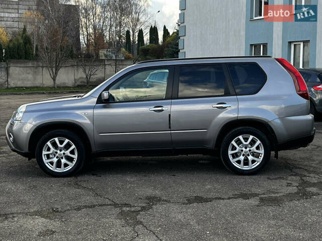 Серый Ниссан ИксТрейл, объемом двигателя 2 л и пробегом 269 тыс. км за 13399 $, фото 9 на Automoto.ua