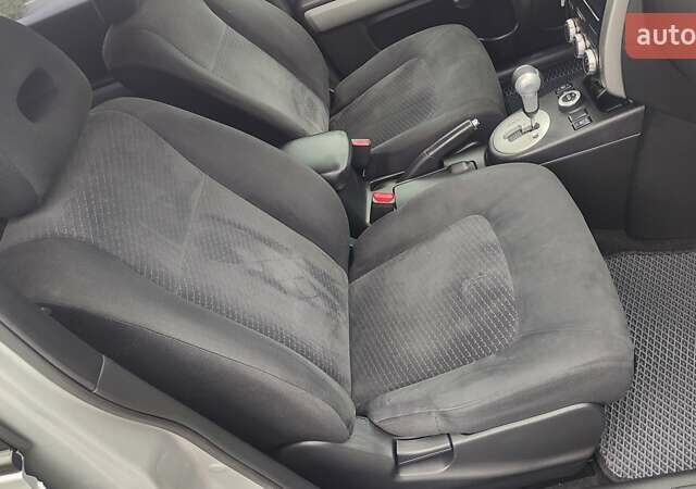 Серый Ниссан ИксТрейл, объемом двигателя 2.49 л и пробегом 217 тыс. км за 10000 $, фото 17 на Automoto.ua