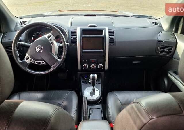 Сірий Ніссан ІксТрейл, об'ємом двигуна 2.49 л та пробігом 236 тис. км за 10999 $, фото 9 на Automoto.ua