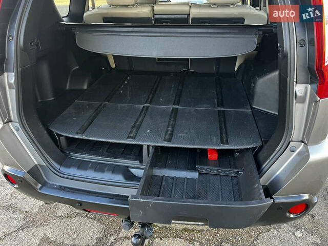 Сірий Ніссан ІксТрейл, об'ємом двигуна 2 л та пробігом 269 тис. км за 13399 $, фото 51 на Automoto.ua