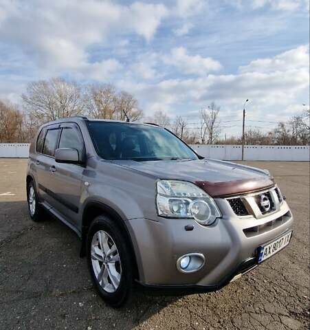 Сірий Ніссан ІксТрейл, об'ємом двигуна 2.49 л та пробігом 236 тис. км за 10999 $, фото 3 на Automoto.ua
