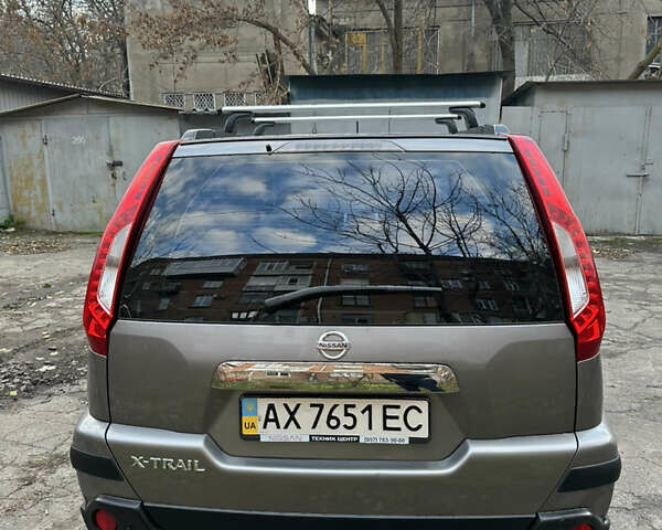 Сірий Ніссан ІксТрейл, об'ємом двигуна 2.49 л та пробігом 79 тис. км за 11150 $, фото 4 на Automoto.ua