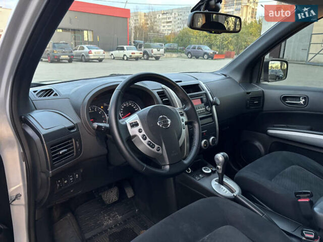 Сірий Ніссан ІксТрейл, об'ємом двигуна 2 л та пробігом 142 тис. км за 9900 $, фото 8 на Automoto.ua