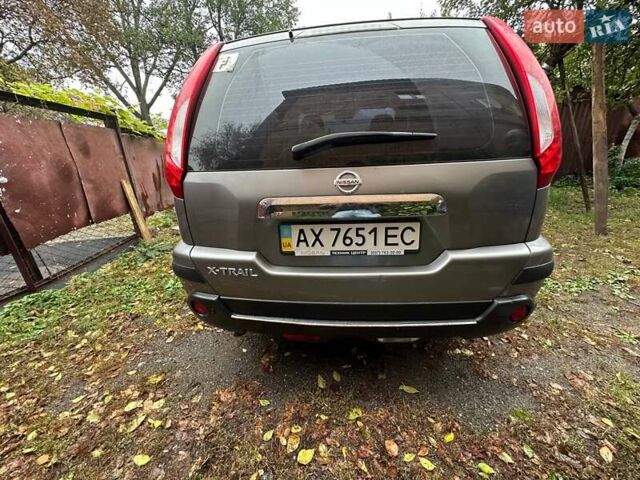 Серый Ниссан ИксТрейл, объемом двигателя 2.49 л и пробегом 79 тыс. км за 10800 $, фото 1 на Automoto.ua