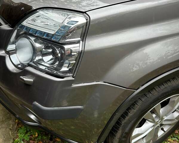 Серый Ниссан ИксТрейл, объемом двигателя 2.49 л и пробегом 79 тыс. км за 10800 $, фото 16 на Automoto.ua