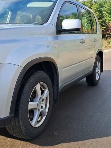 Сірий Ніссан ІксТрейл, об'ємом двигуна 2 л та пробігом 297 тис. км за 12350 $, фото 7 на Automoto.ua