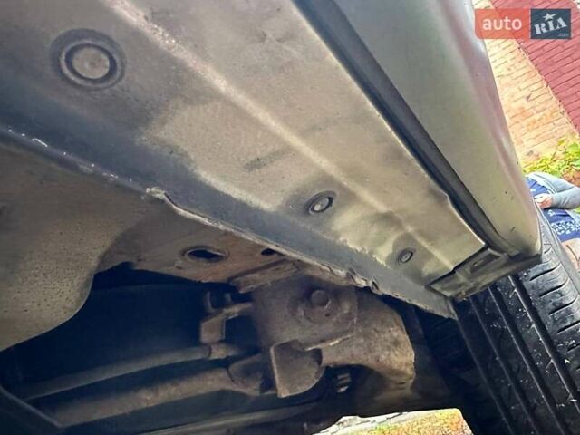 Серый Ниссан ИксТрейл, объемом двигателя 2.49 л и пробегом 79 тыс. км за 10800 $, фото 11 на Automoto.ua