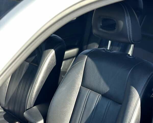 Серый Ниссан ИксТрейл, объемом двигателя 2 л и пробегом 198 тыс. км за 12500 $, фото 4 на Automoto.ua