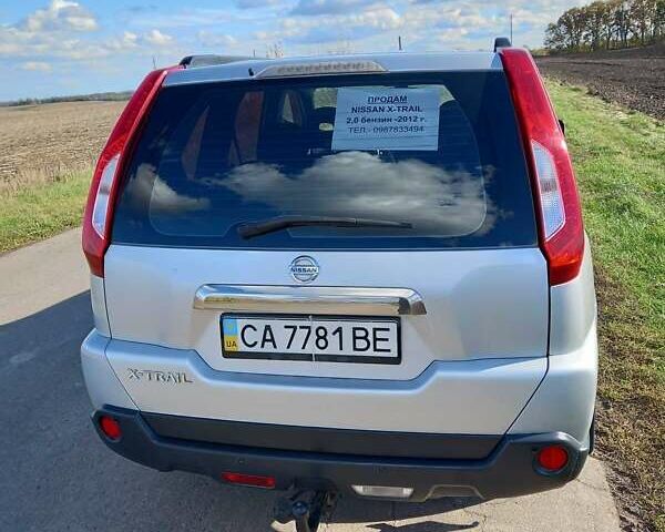 Серый Ниссан ИксТрейл, объемом двигателя 2 л и пробегом 90 тыс. км за 12500 $, фото 3 на Automoto.ua