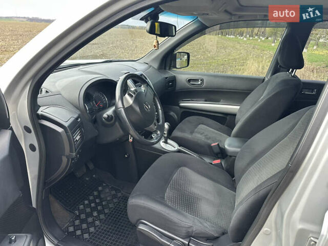 Серый Ниссан ИксТрейл, объемом двигателя 2 л и пробегом 158 тыс. км за 10300 $, фото 18 на Automoto.ua