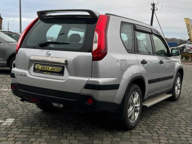 Сірий Ніссан ІксТрейл, об'ємом двигуна 2 л та пробігом 198 тис. км за 12999 $, фото 6 на Automoto.ua