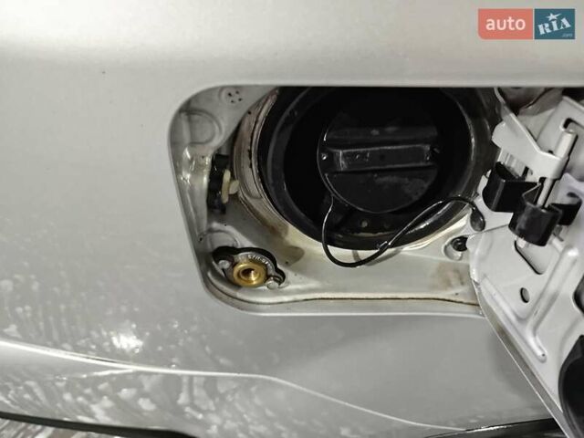 Серый Ниссан ИксТрейл, объемом двигателя 2 л и пробегом 210 тыс. км за 11200 $, фото 4 на Automoto.ua