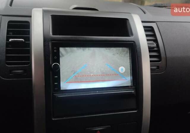 Серый Ниссан ИксТрейл, объемом двигателя 2 л и пробегом 230 тыс. км за 11500 $, фото 42 на Automoto.ua