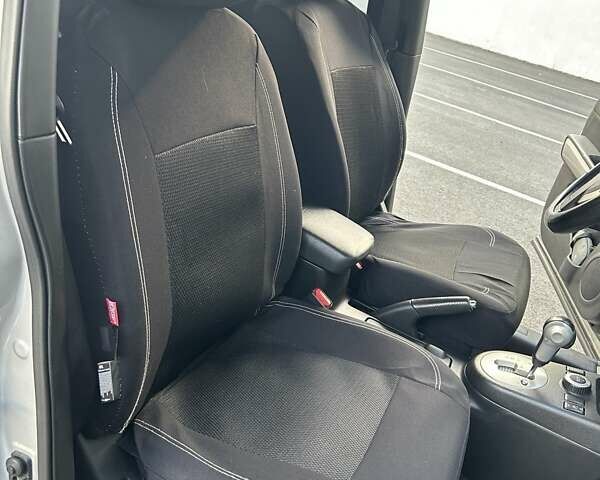 Серый Ниссан ИксТрейл, объемом двигателя 2 л и пробегом 185 тыс. км за 13000 $, фото 12 на Automoto.ua