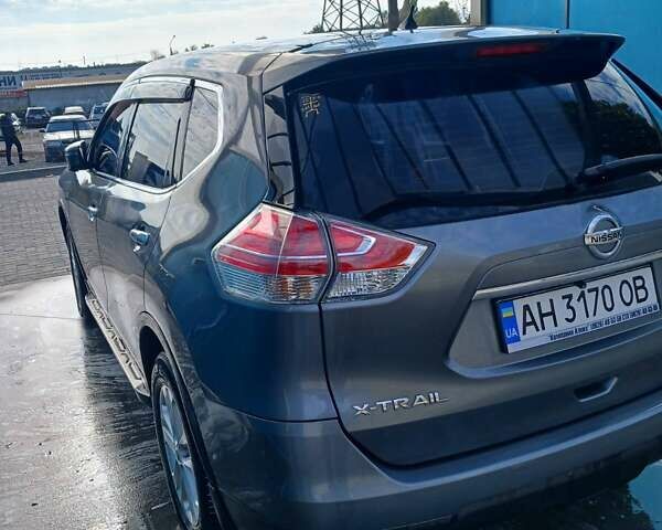 Сірий Ніссан ІксТрейл, об'ємом двигуна 2 л та пробігом 75 тис. км за 13999 $, фото 4 на Automoto.ua