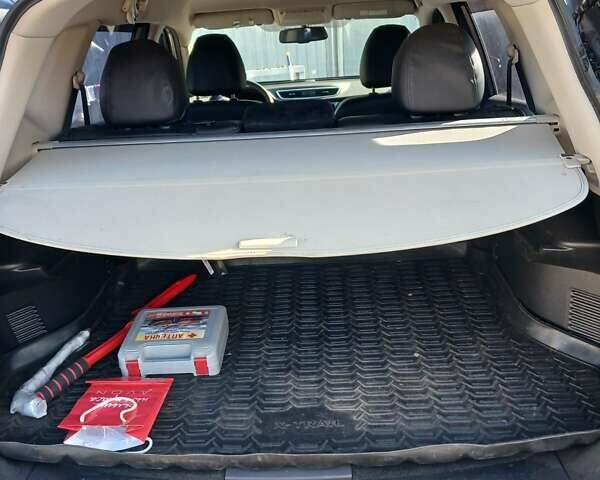 Сірий Ніссан ІксТрейл, об'ємом двигуна 2 л та пробігом 75 тис. км за 13999 $, фото 7 на Automoto.ua