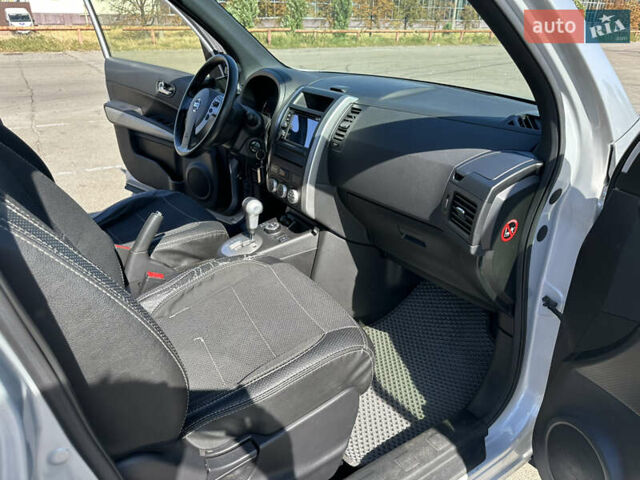 Серый Ниссан ИксТрейл, объемом двигателя 2 л и пробегом 71 тыс. км за 15500 $, фото 13 на Automoto.ua