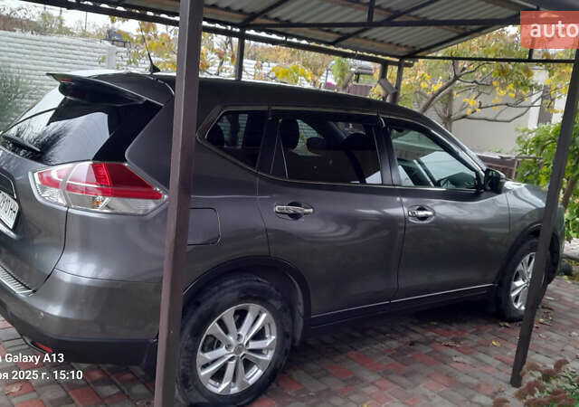 Сірий Ніссан ІксТрейл, об'ємом двигуна 2 л та пробігом 79 тис. км за 14500 $, фото 3 на Automoto.ua