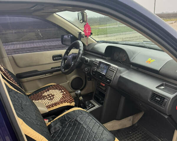 Синій Ніссан ІксТрейл, об'ємом двигуна 2 л та пробігом 222 тис. км за 4400 $, фото 7 на Automoto.ua