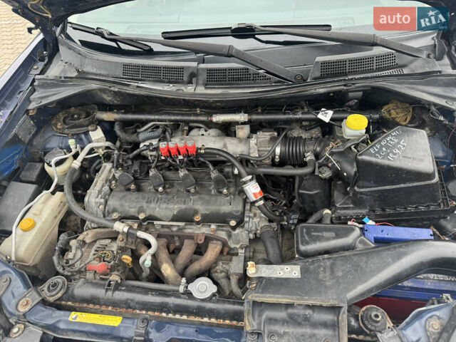 Синий Ниссан ИксТрейл, объемом двигателя 2 л и пробегом 222 тыс. км за 4700 $, фото 6 на Automoto.ua